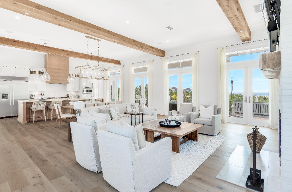 90 Sandstone Street Santa Rosa Beach, FL 32459 - Photo 43 of 73 a living room with lots of furniture and a large window
