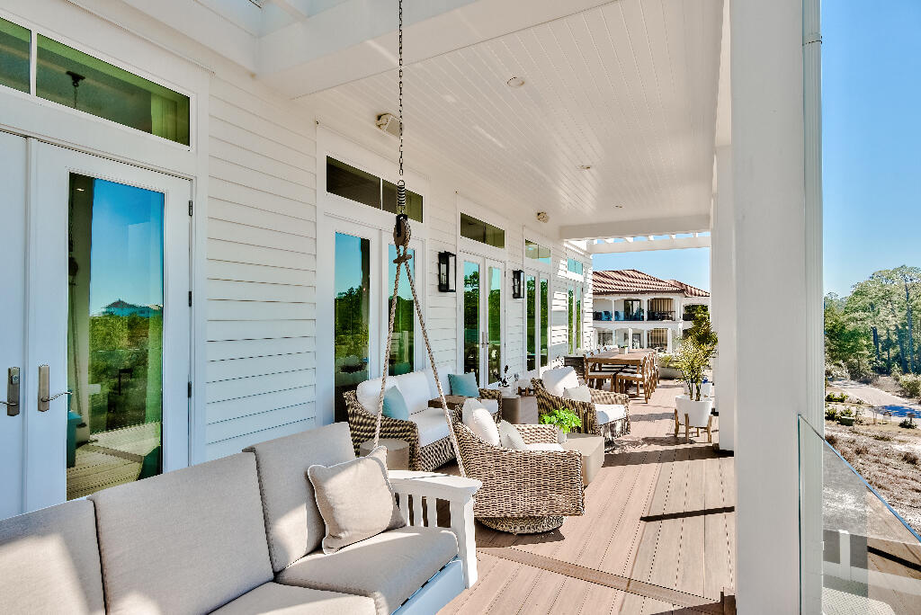 90 Sandstone Street Santa Rosa Beach, FL 32459 - Photo 46 of 73 a living room with furniture and a large window