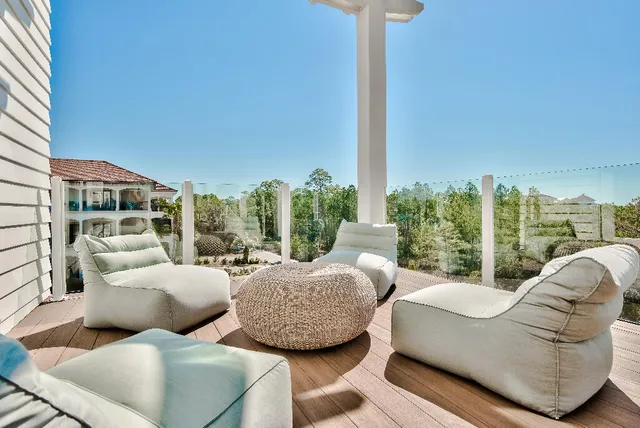 an aerial view of a house with a big yard