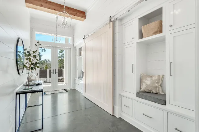 a kitchen with a table chairs and a stove