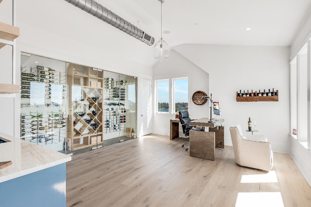 90 Sandstone Street Santa Rosa Beach, FL 32459 - Photo 61 of 73 a living room with furniture and a large window