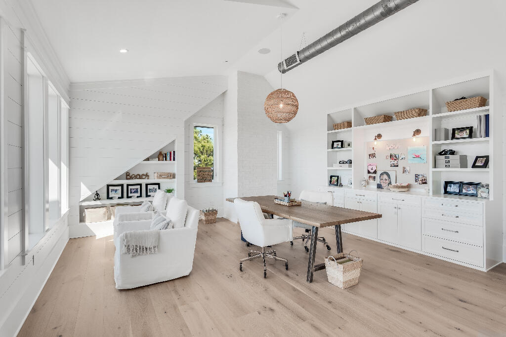 90 Sandstone Street Santa Rosa Beach, FL 32459 - Photo 65 of 73 a living room with furniture and a large window