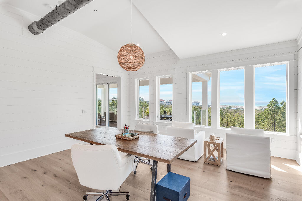 90 Sandstone Street Santa Rosa Beach, FL 32459 - Photo 67 of 73 a view of a dining room with furniture window and wooden floor