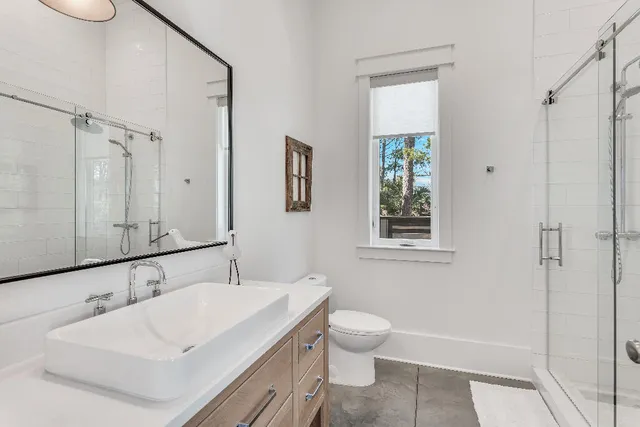 a kitchen with stainless steel appliances a stove microwave and sink
