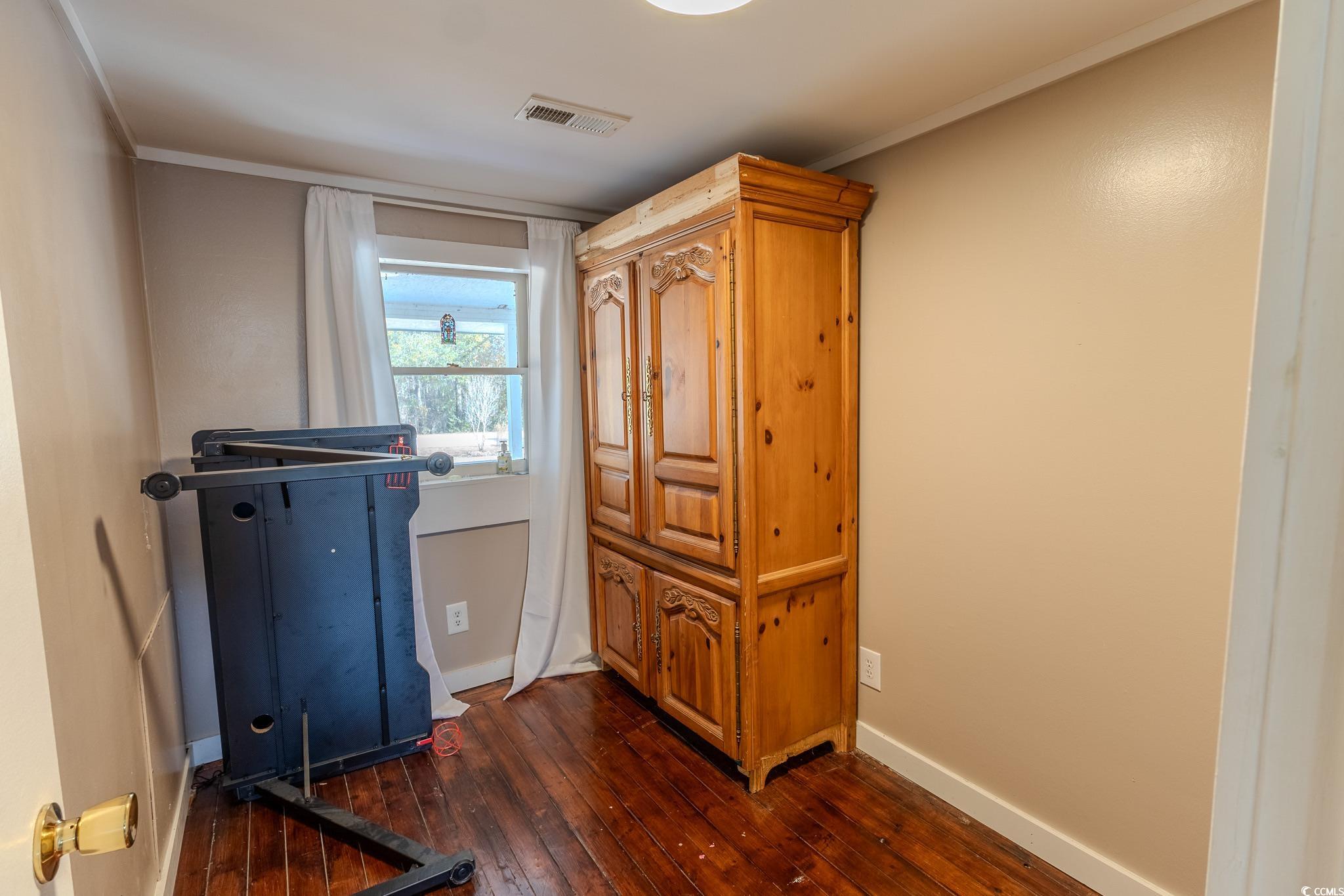 7755 Hunting Swamp Road Conway, SC 29527 - Photo 13 of 19 Spare room featuring light wood-style flooring and baseboards