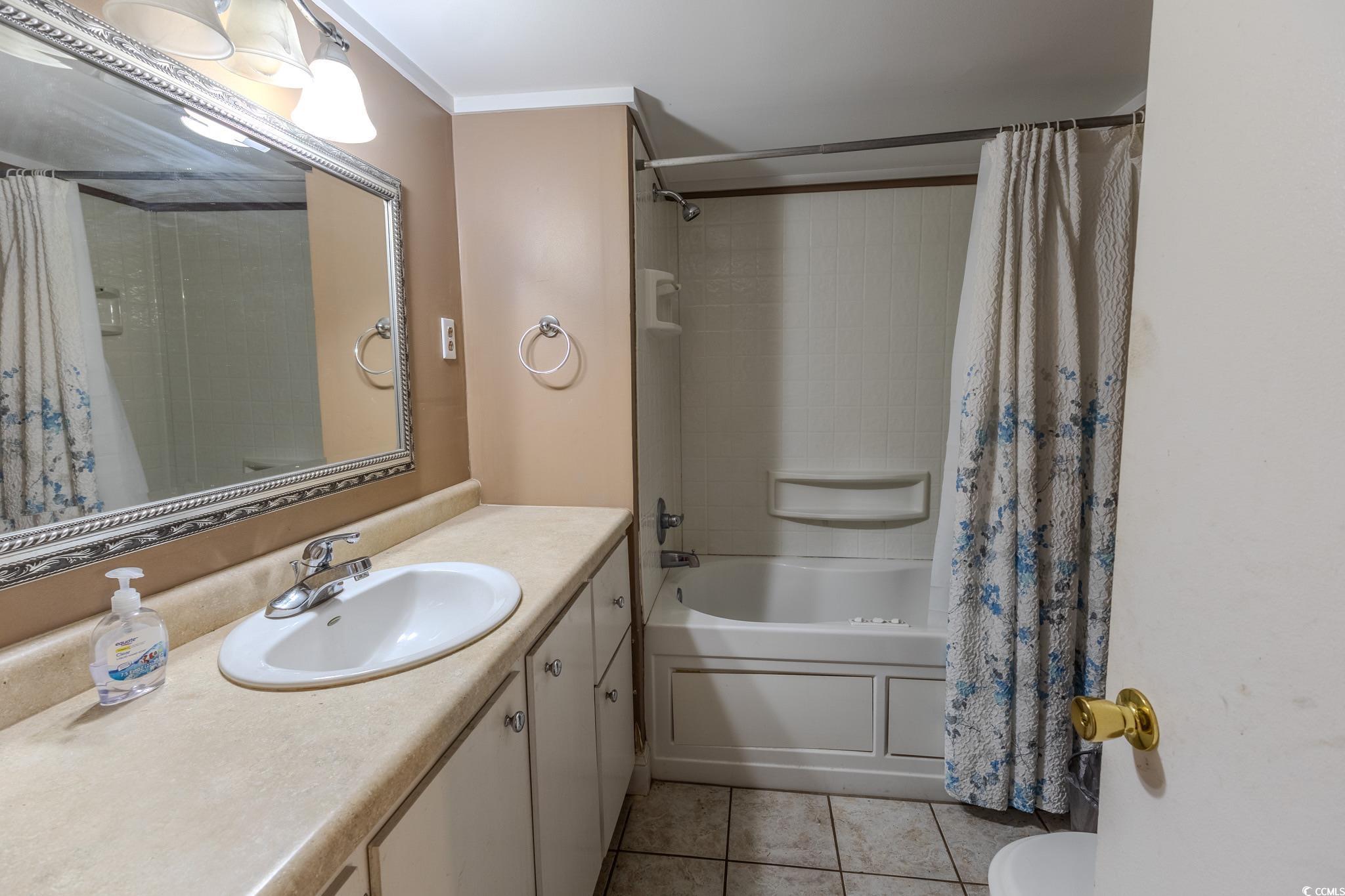 7755 Hunting Swamp Road Conway, SC 29527 - Photo 14 of 19 Spare room with wood finished floors and ornamental molding
