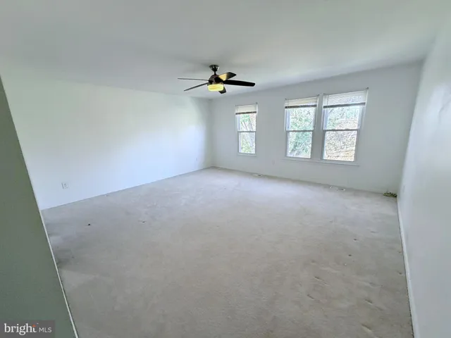 a bathroom with a sink a toilet and a bathtub