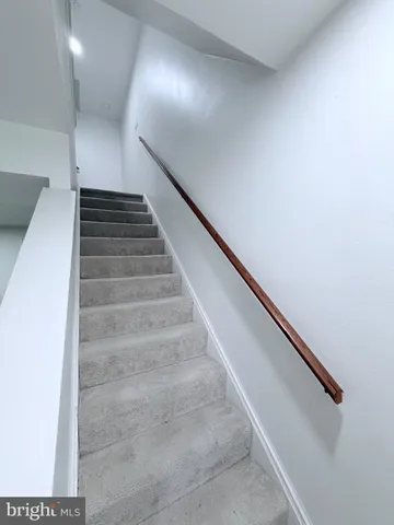 a bathroom with a toilet and a vanity