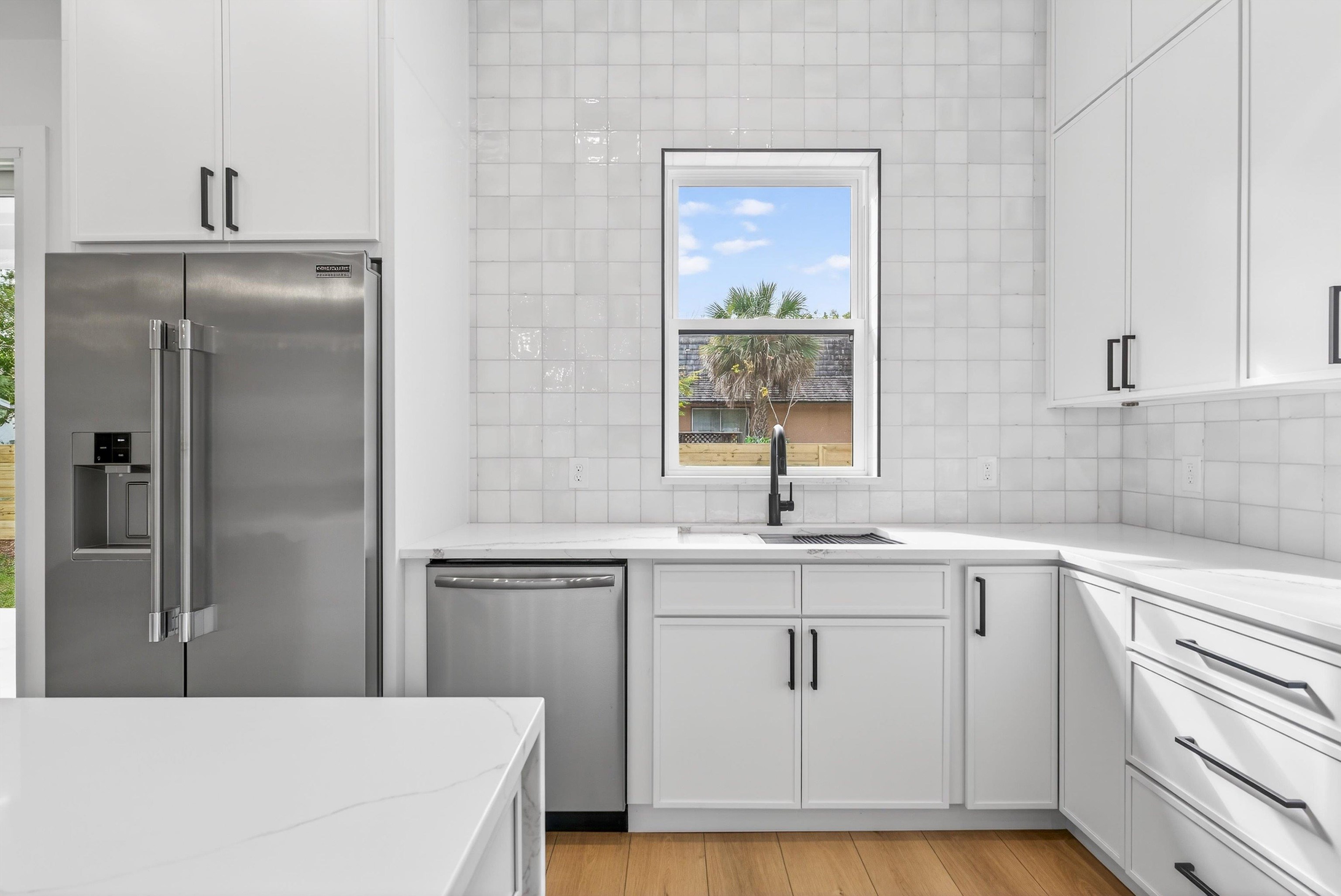 16 Baru Road St. Augustine, FL 32080 - Photo 29 of 73 a kitchen with a sink appliances and cabinets
