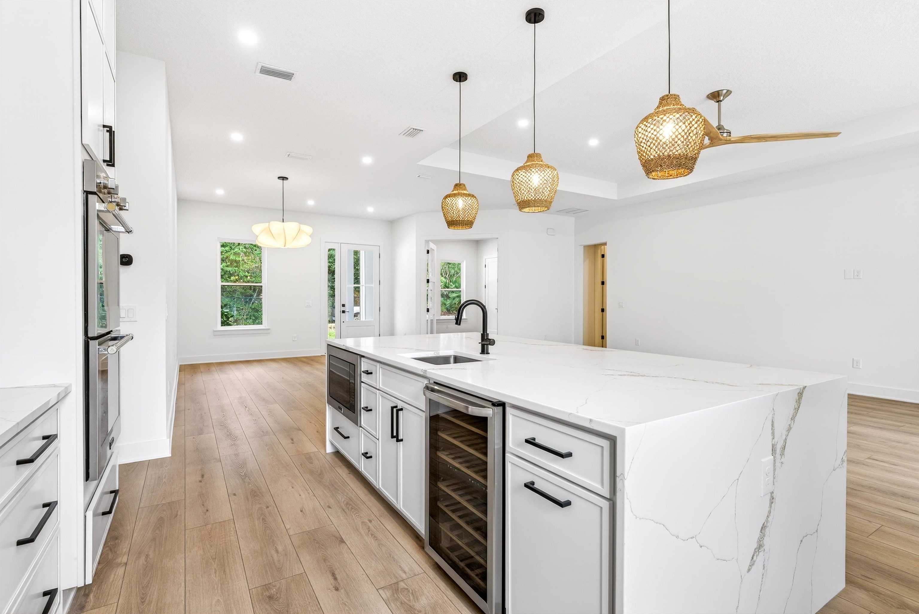 16 Baru Road St. Augustine, FL 32080 - Photo 30 of 73 a kitchen with a counter space a sink and appliances