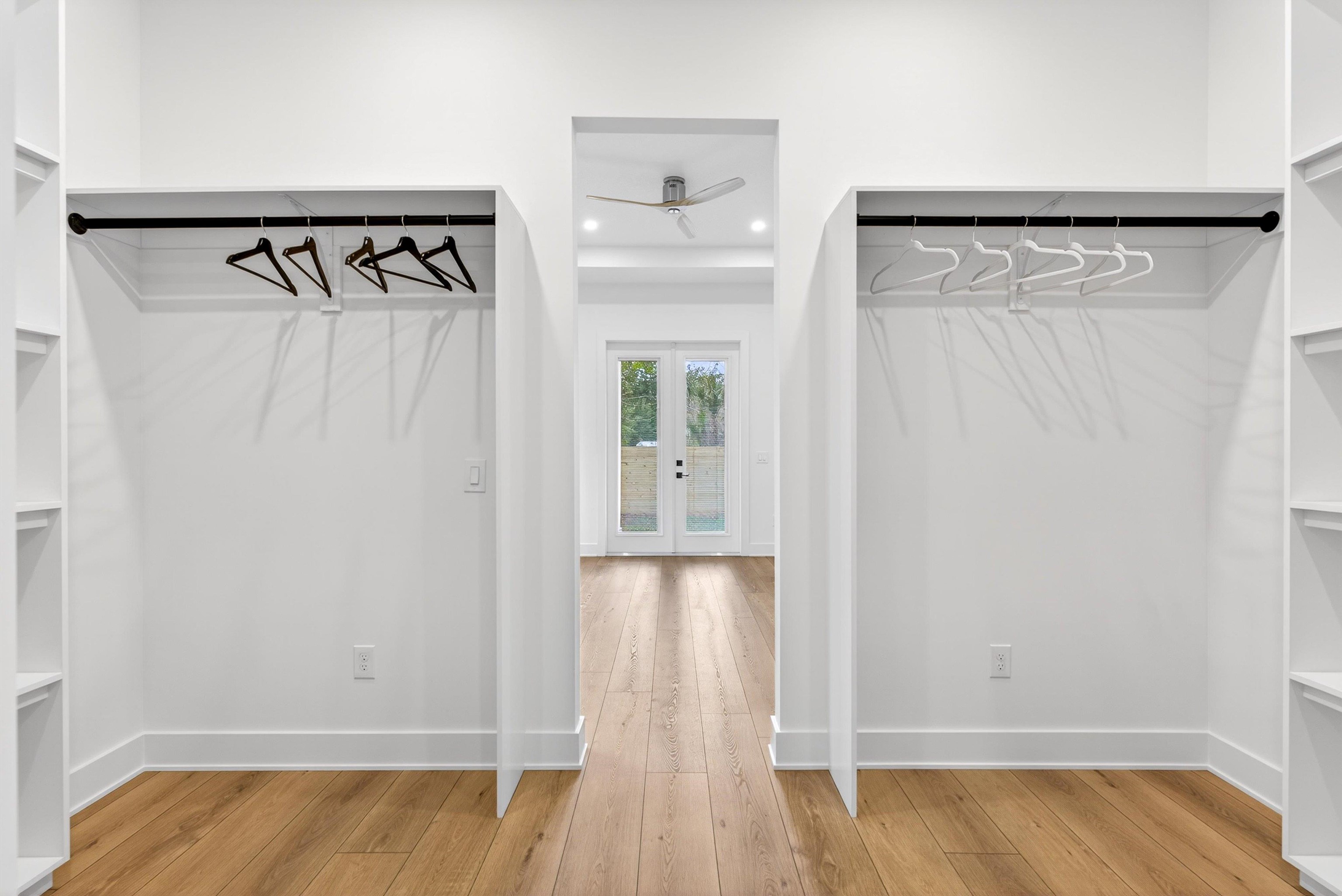 16 Baru Road St. Augustine, FL 32080 - Photo 34 of 73 Walk in closet featuring light wood finished floors and a ceiling fan