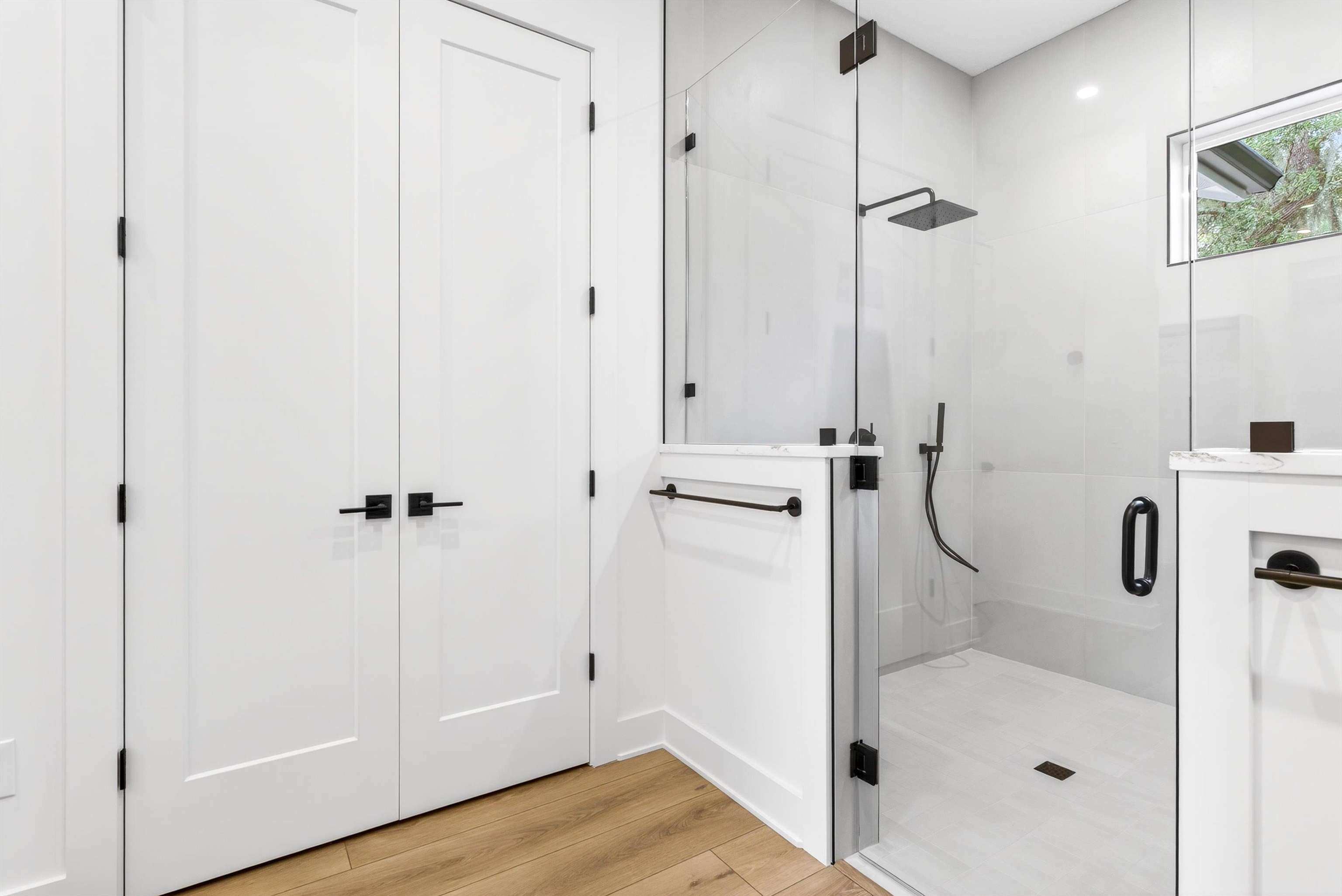 16 Baru Road St. Augustine, FL 32080 - Photo 41 of 73 a bathroom with a glass shower door