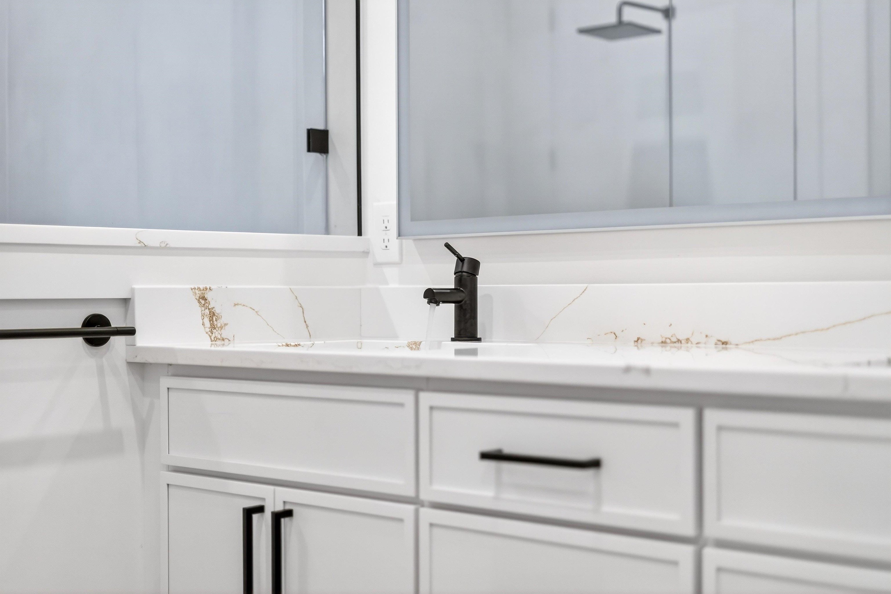 16 Baru Road St. Augustine, FL 32080 - Photo 44 of 73 a bathroom with a sink and a mirror