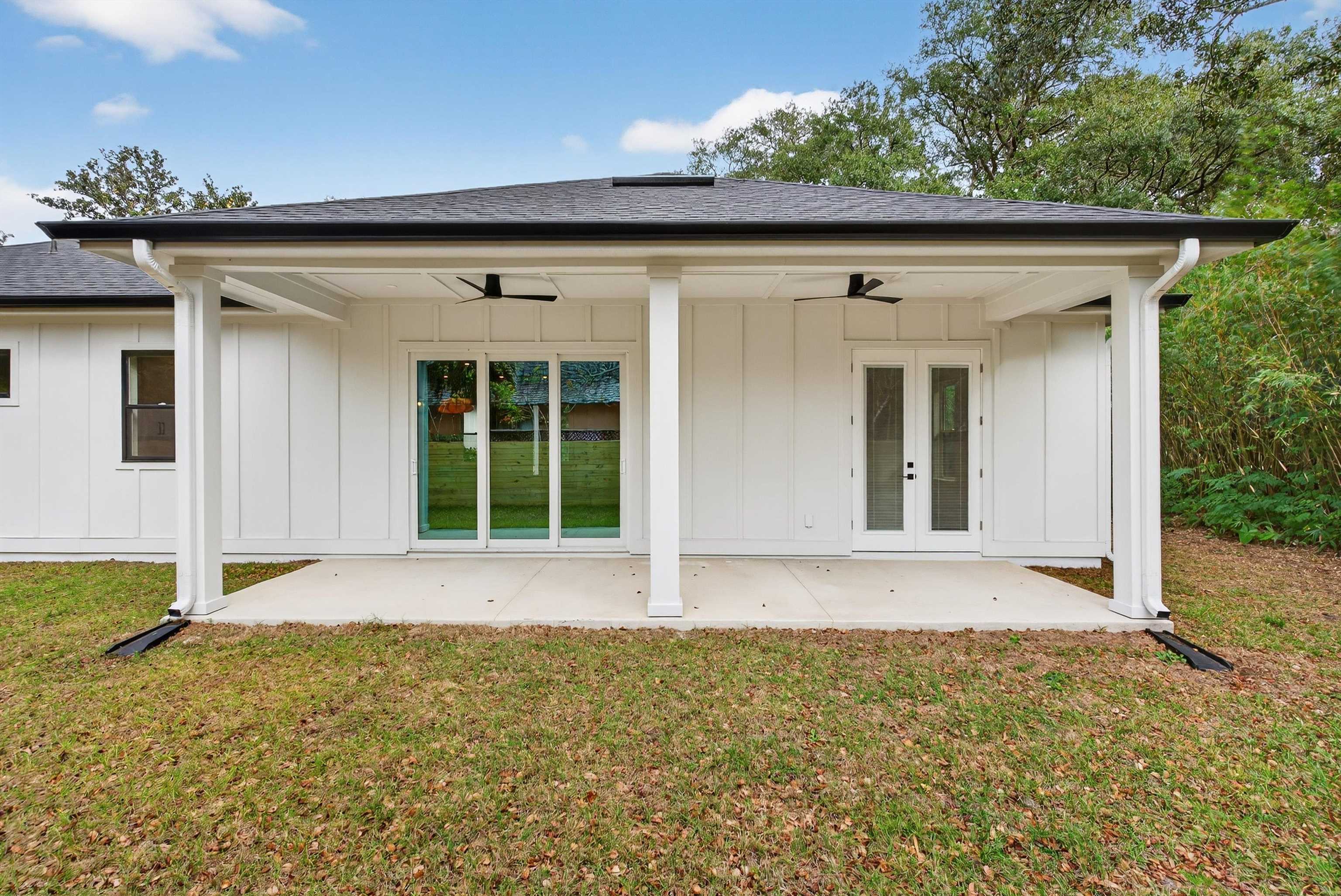 16 Baru Road St. Augustine, FL 32080 - Photo 55 of 73 front view of a house with a yard