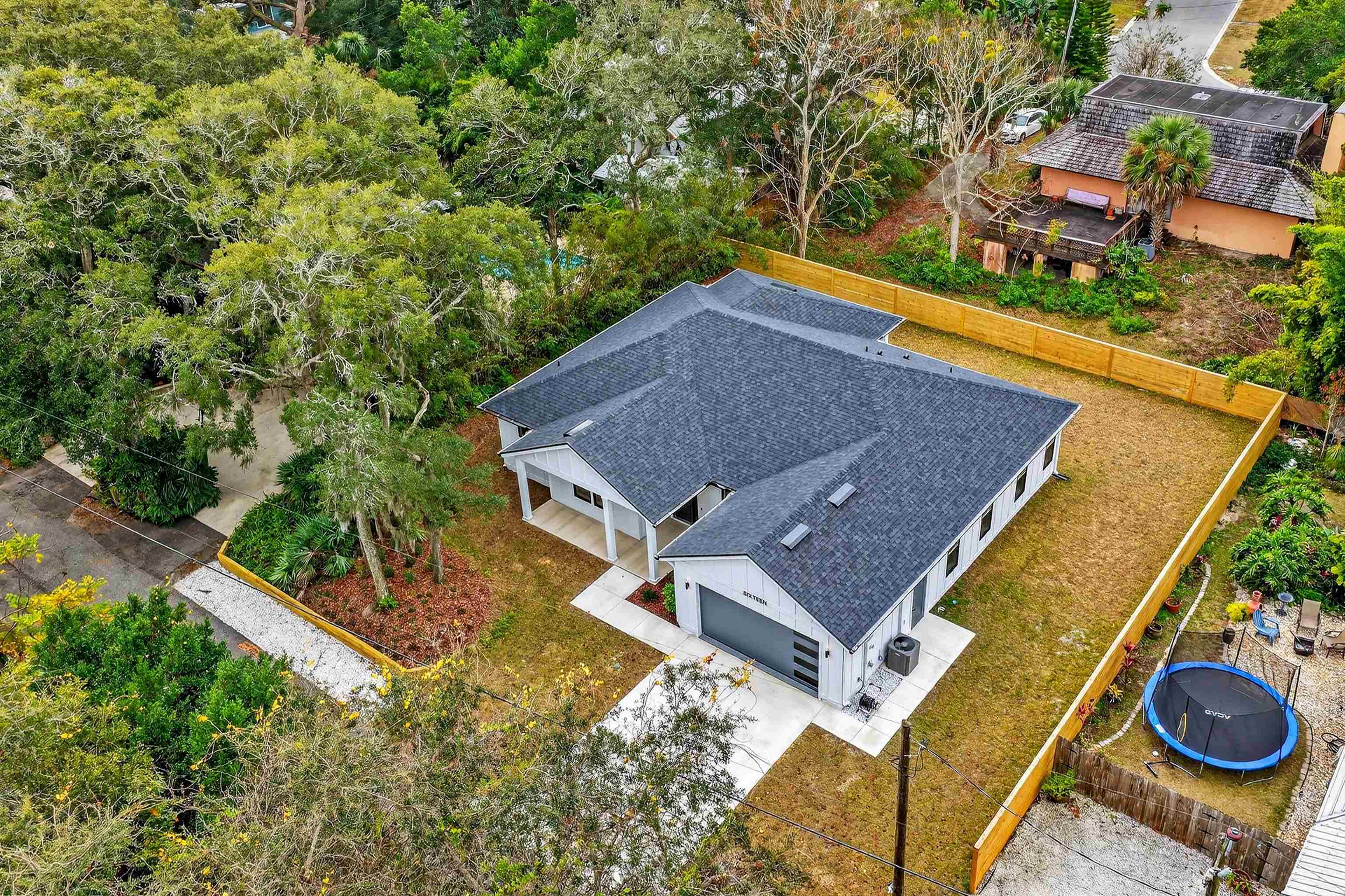 16 Baru Road St. Augustine, FL 32080 - Photo 65 of 73 an aerial view of a house with swimming pool and trees