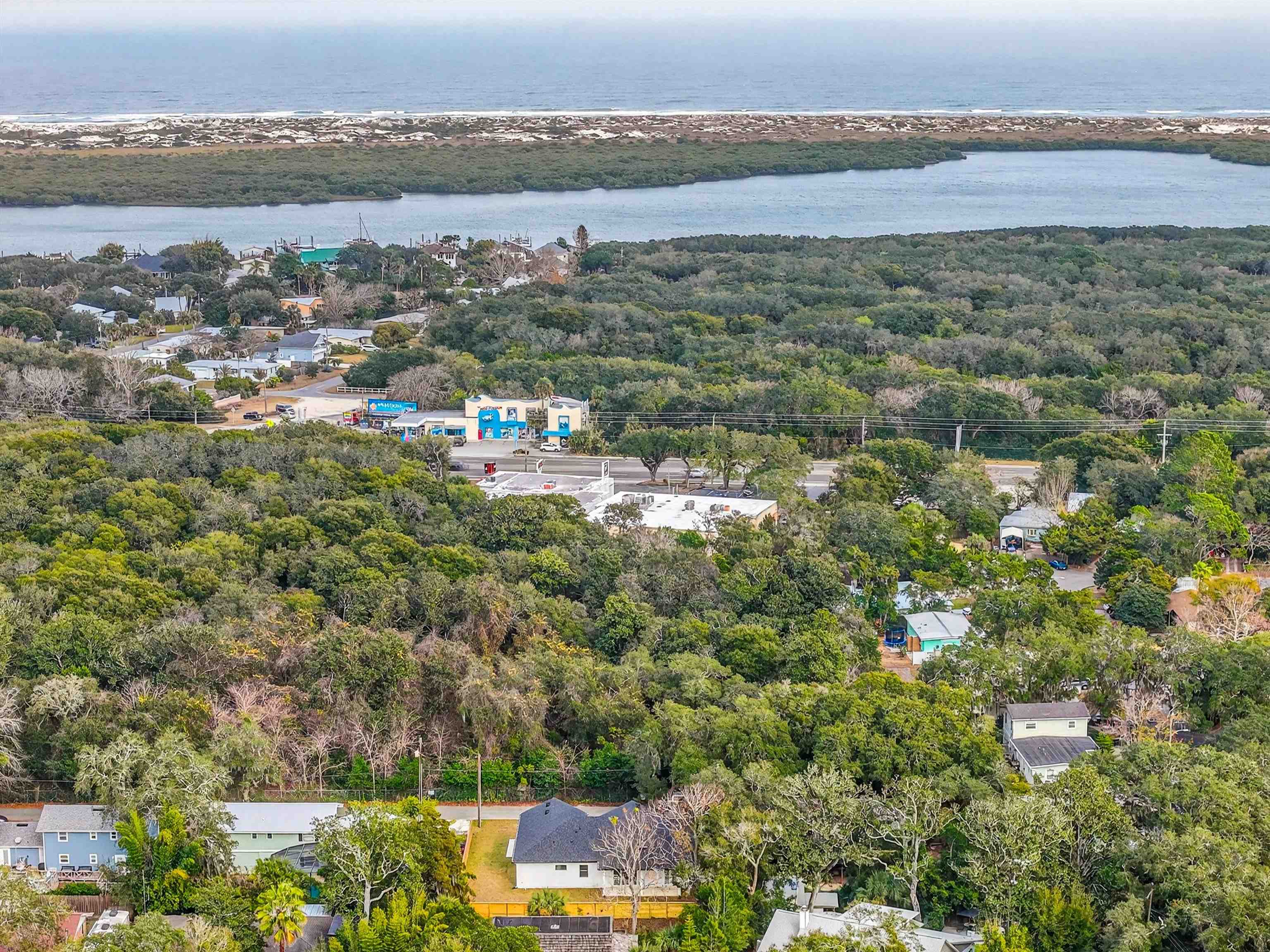 16 Baru Road St. Augustine, FL 32080 - Photo 69 of 73 Aerial overview of property's location featuring a large body of water and nearby suburban area