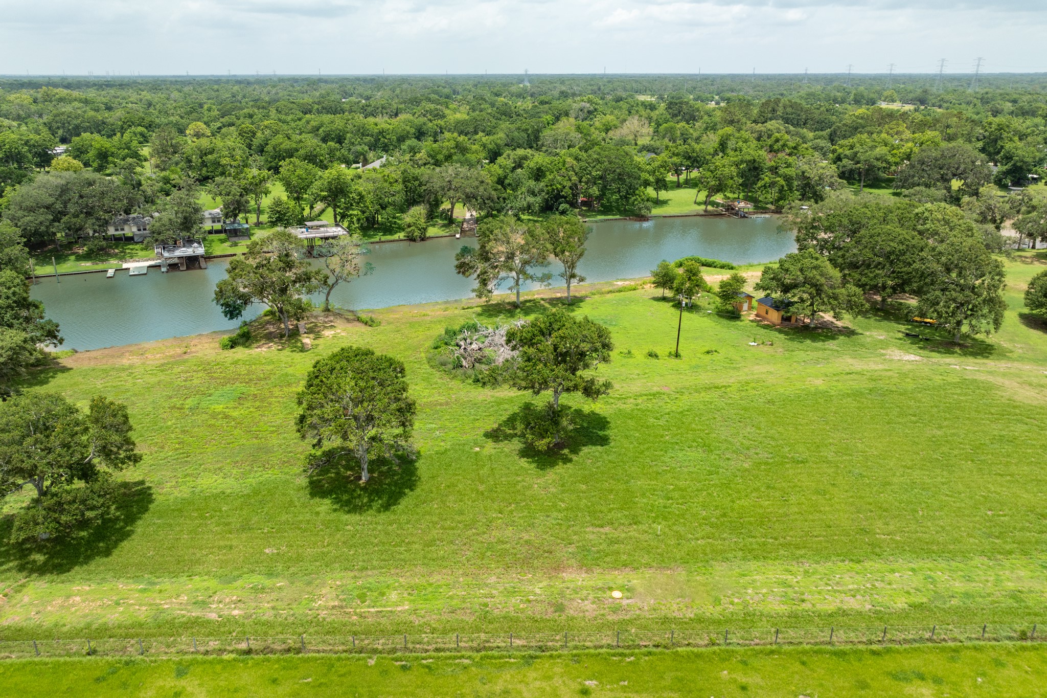 2 County Road 344 Sweeny, TX 77480 - Photo 13 of 20 a view of a lake with a yard