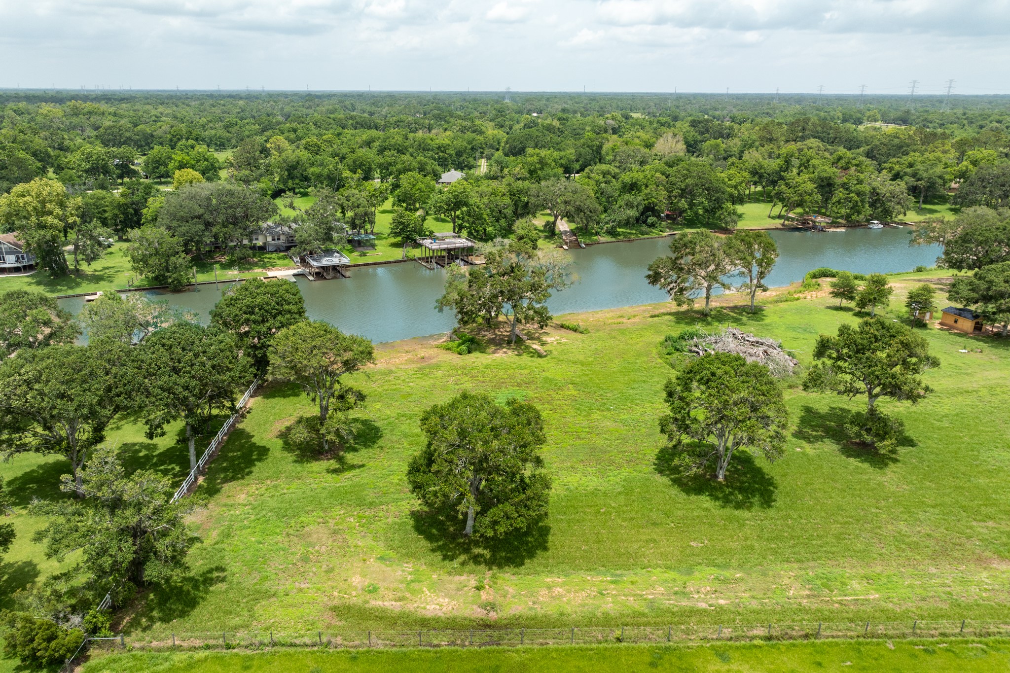 2 County Road 344 Sweeny, TX 77480 - Photo 14 of 20 a view of a lake with a city