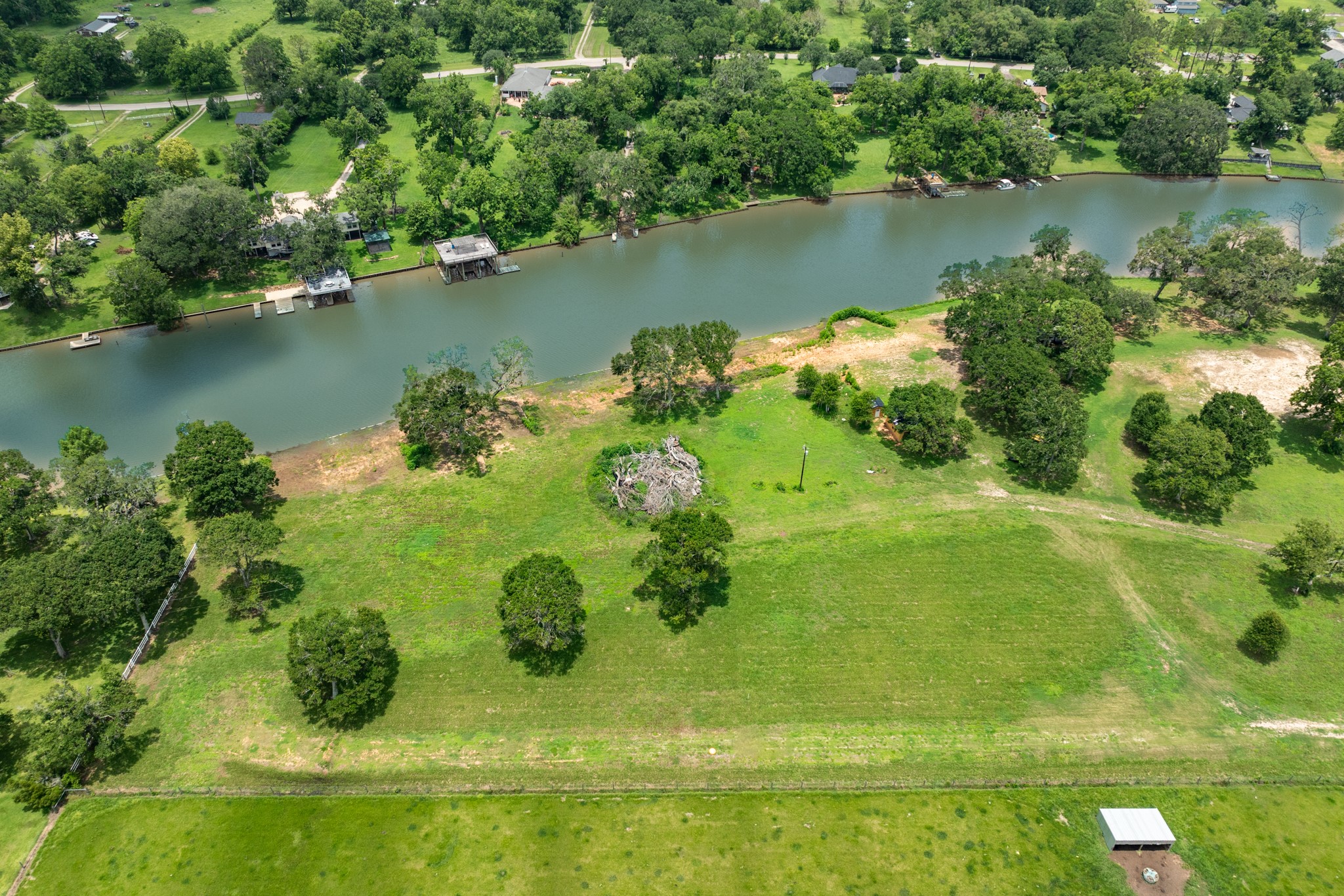 2 County Road 344 Sweeny, TX 77480 - Photo 15 of 20 an aerial view of a houses with a yard and lake view