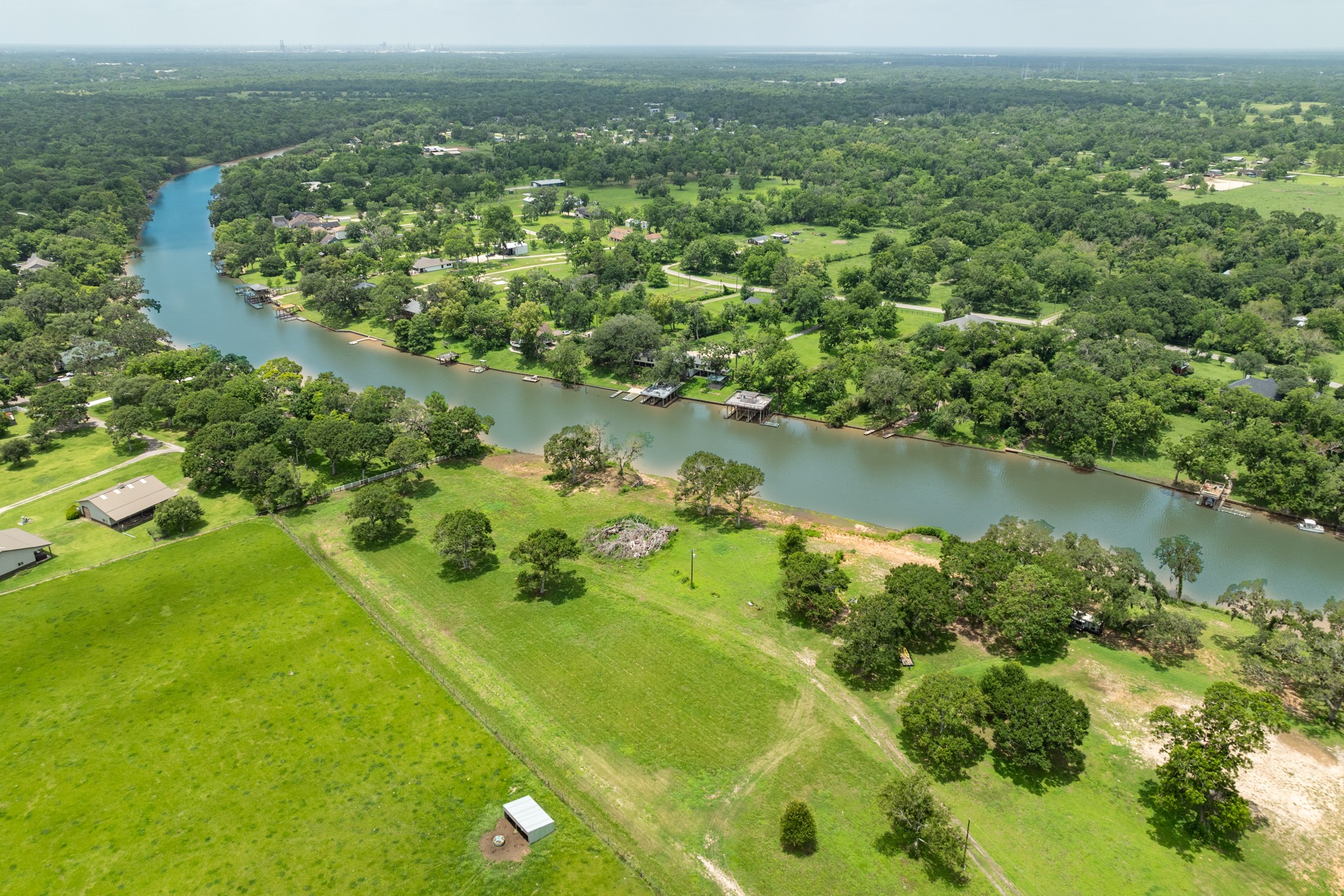 2 County Road 344 Sweeny, TX 77480 - Photo 18 of 20 an aerial view of residential houses with outdoor space and trees all around