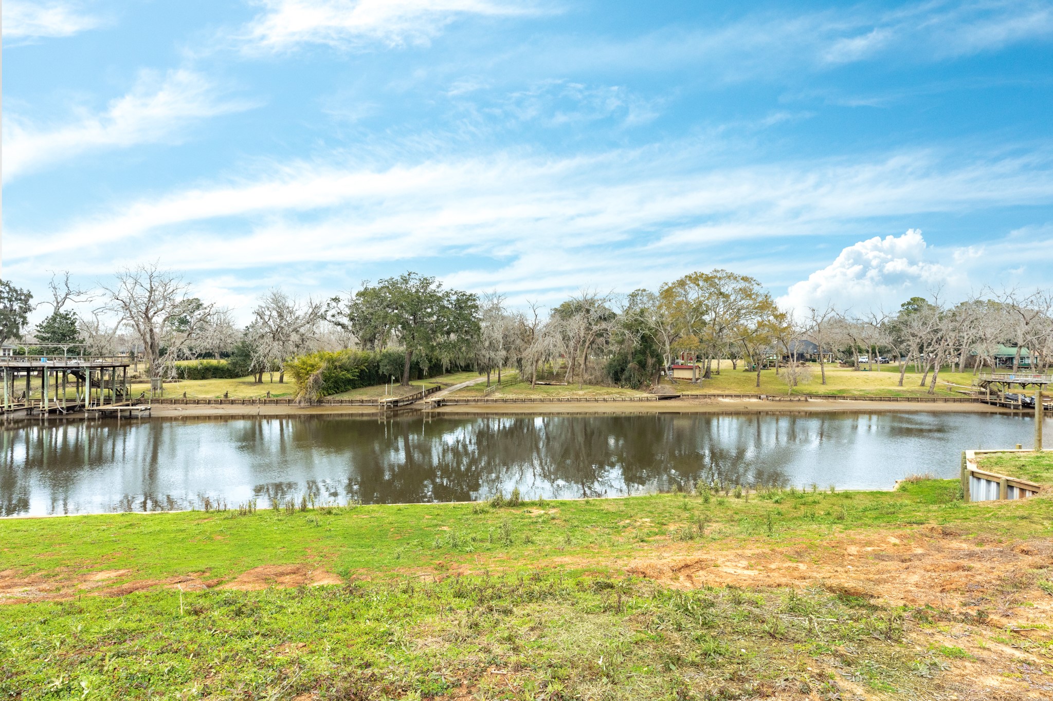 2 County Road 344 Sweeny, TX 77480 - Photo 8 of 20 a view of a lake with a city