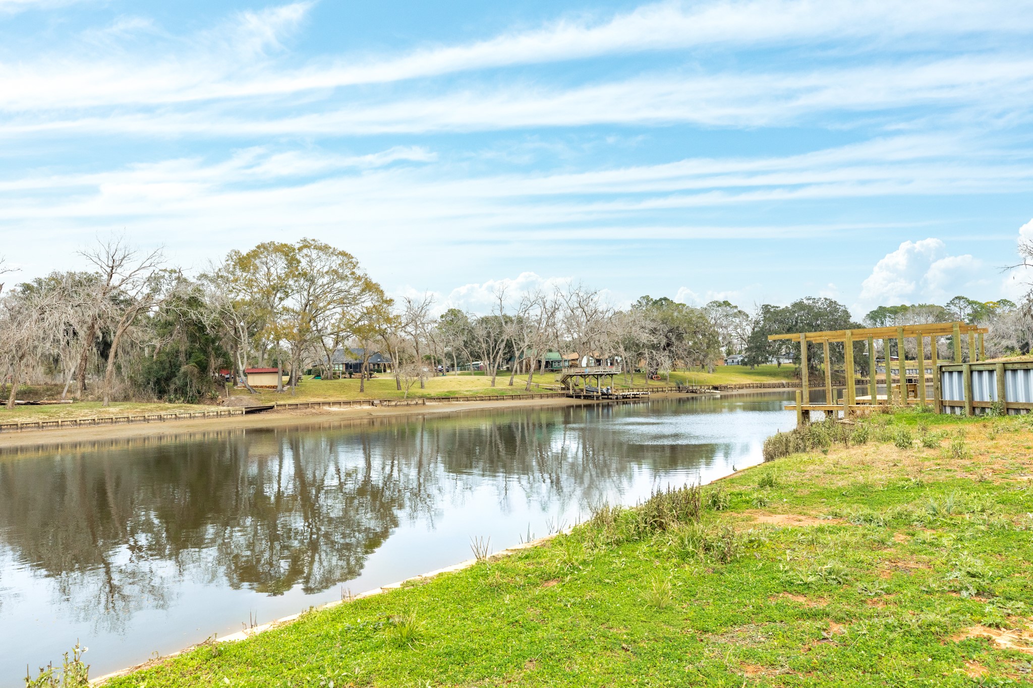 2 County Road 344 Sweeny, TX 77480 - Photo 9 of 20 a view of a lake with houses in the back