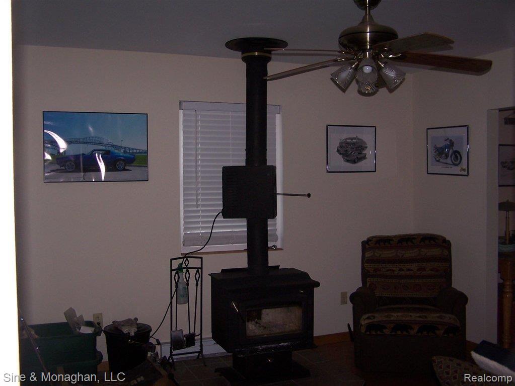 6946 Frith Road St. Clair, MI 48079 - Photo 15 of 18 wood stove.JPG