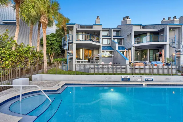 a front view of building with yard