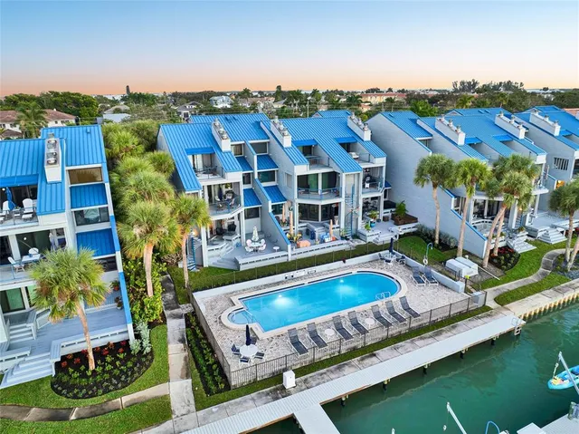 an aerial view of city and lake