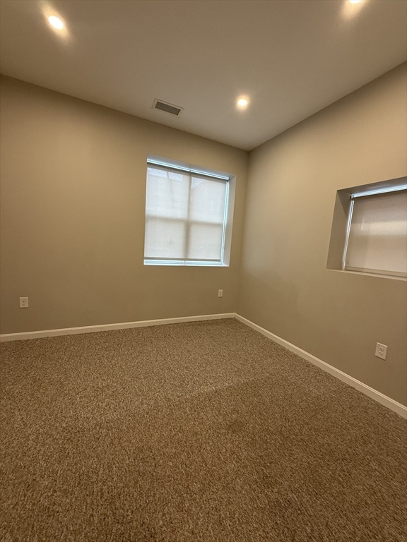 6 Chatham Street, Unit 308 Worcester, MA 01609 - Photo 4 of 10 an empty room with a window