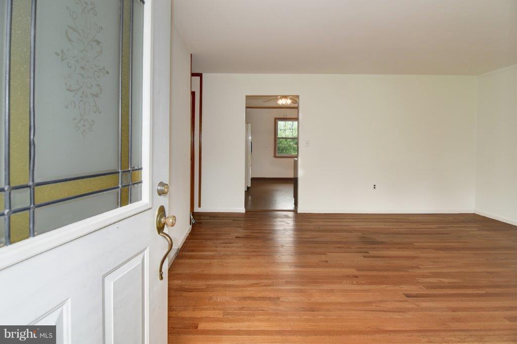 79 Otter Point Road Elkton, MD 21921 - Photo 6 of 22 Living Room-fresh paint and original hardwood
