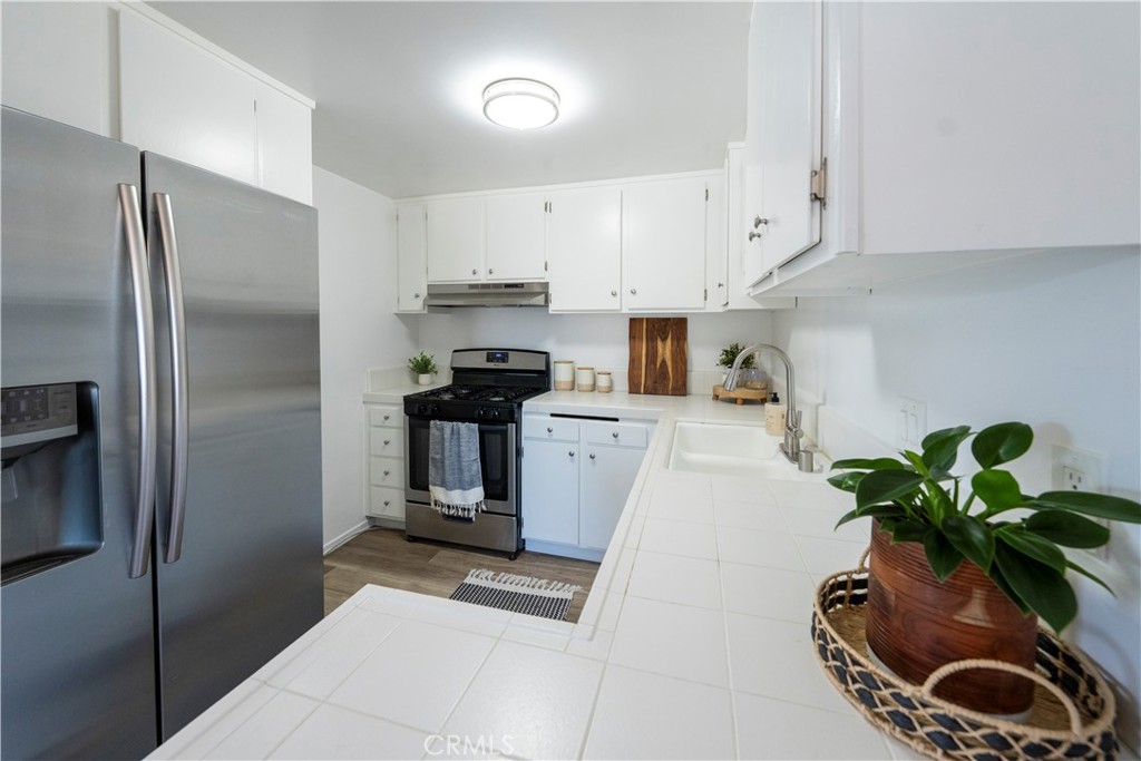 2010 Associated Road, Unit 7 Fullerton, CA 92831 - Photo 5 of 20 Functional Kitchen with lot of cabinets