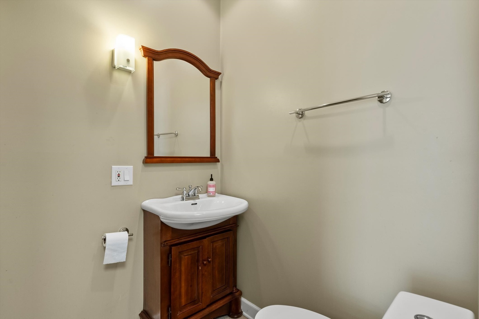 6118 West Addison Street Chicago, IL 60634 - Photo 15 of 35 a bathroom with a sink mirror and toilet