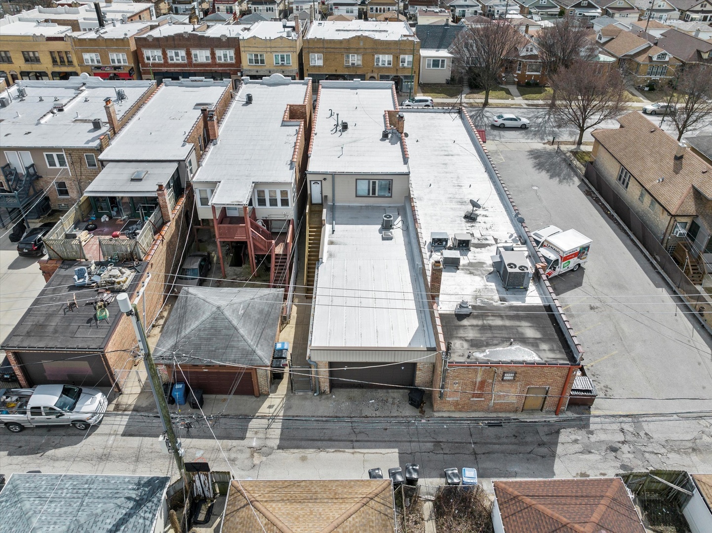 6118 West Addison Street Chicago, IL 60634 - Photo 35 of 35 an aerial view of a building with outdoor seating
