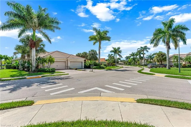a house with palm tree in front of it