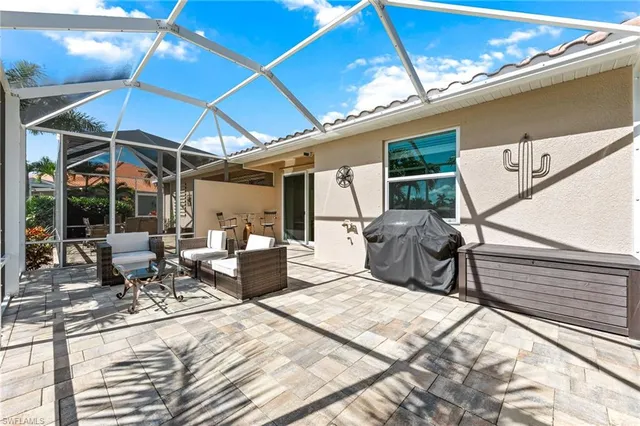 a outdoor space with lots of tables and chairs