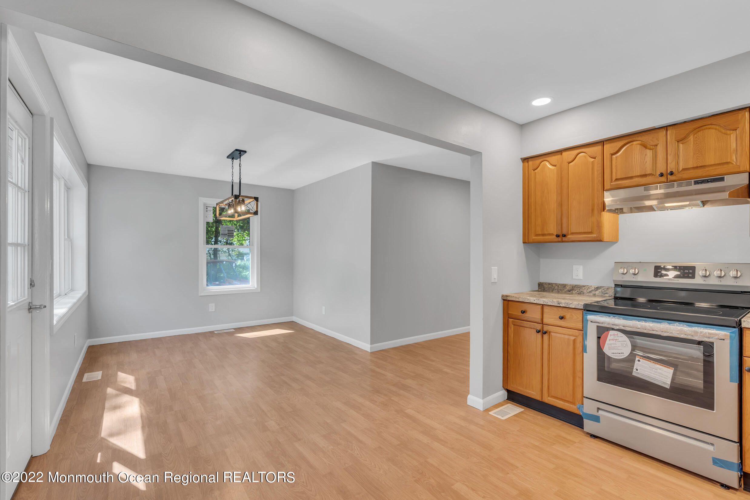 115 West 5th Street Howell, NJ 07731 - Photo 21 of 28 a kitchen with a stove and a cabinet