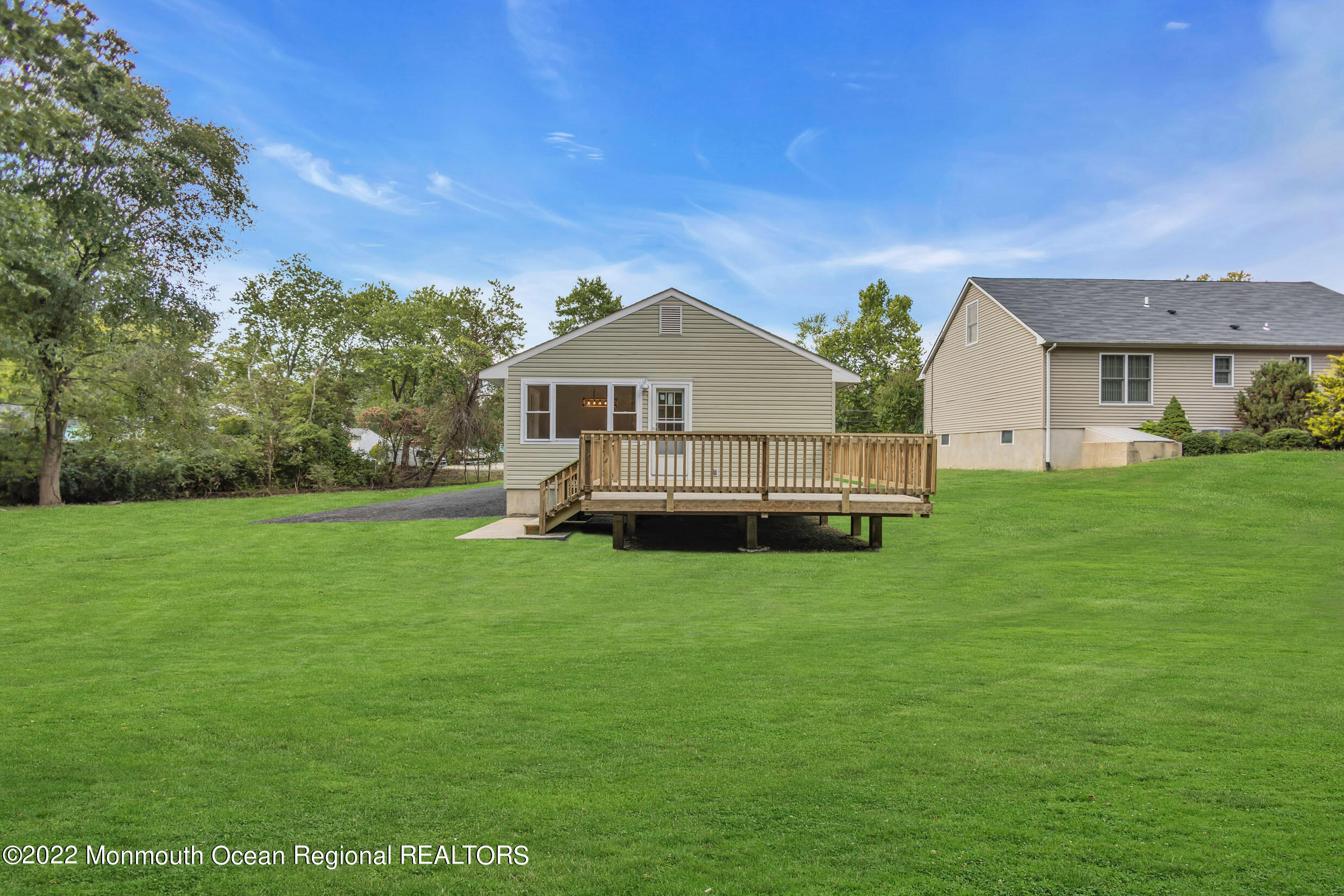 115 West 5th Street Howell, NJ 07731 - Photo 24 of 28 a front view of a house with garden