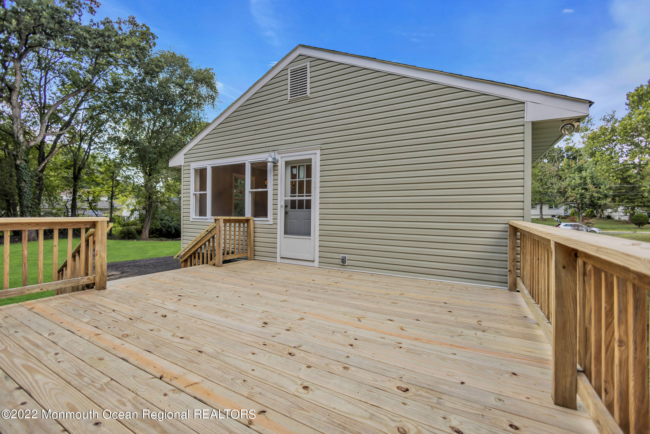 115 West 5th Street Howell, NJ 07731 - Photo 26 of 28 a view of a house with wooden deck