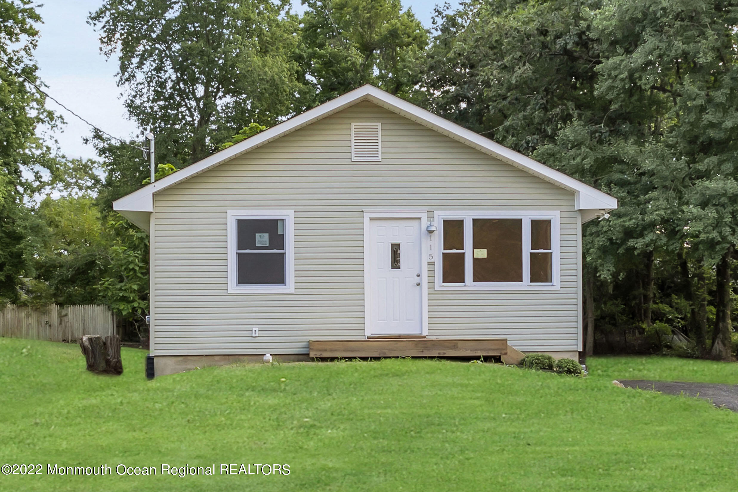115 West 5th Street Howell, NJ 07731 - Photo 3 of 28 a front view of a house with a yard