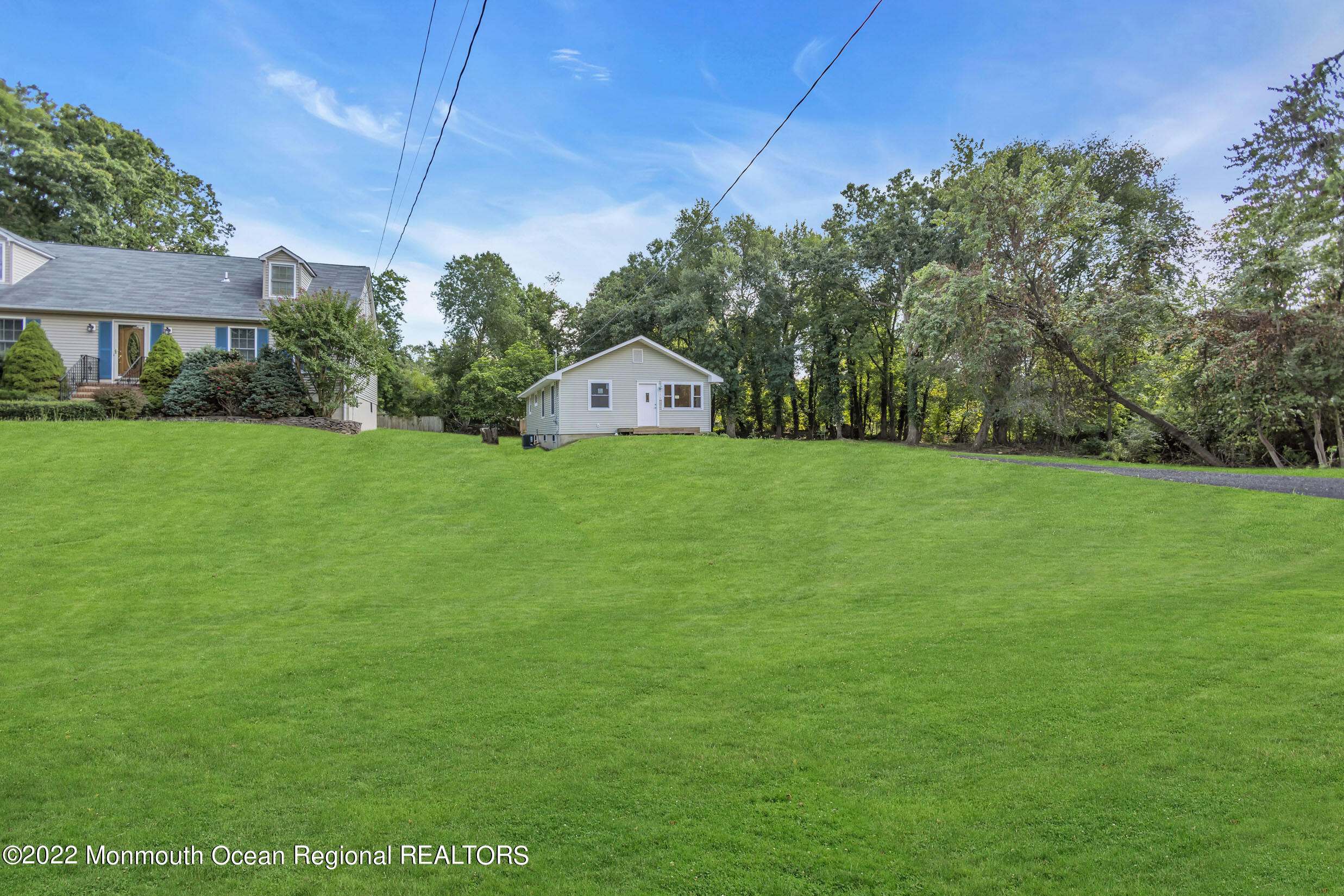 115 West 5th Street Howell, NJ 07731 - Photo 5 of 28 a house view with a garden space