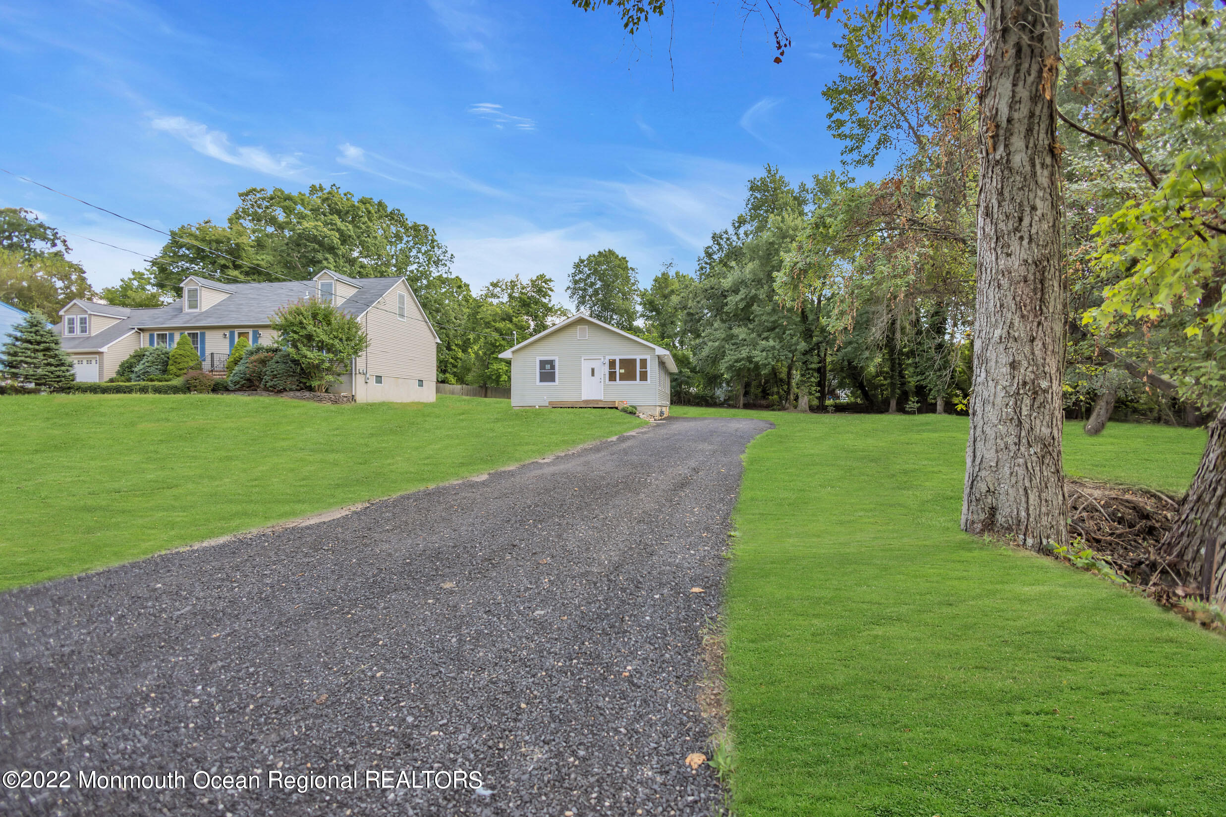 115 West 5th Street Howell, NJ 07731 - Photo 7 of 28 a front view of a house with a yard