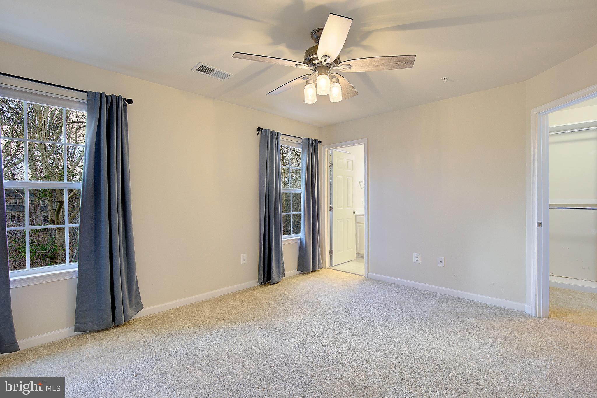 8410 Clear Spring Drive, Unit 1 Chesapeake Beach, MD 20732 - Photo 22 of 41 a view of an empty room with a window