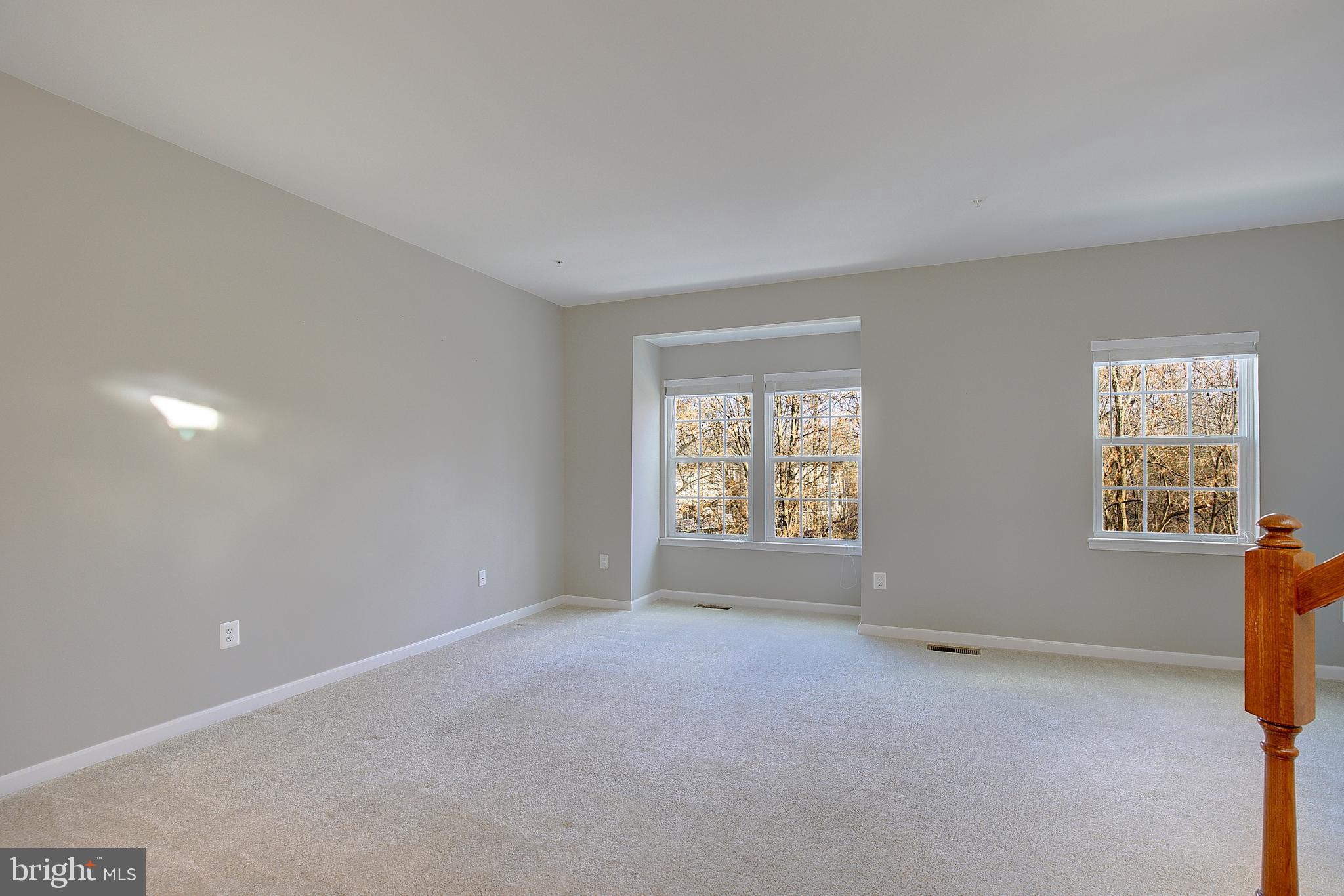 8410 Clear Spring Drive, Unit 1 Chesapeake Beach, MD 20732 - Photo 30 of 41 a view of an empty room with a window