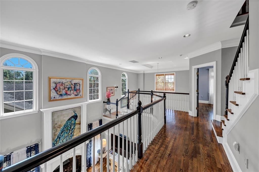 526 Hill Street Southeast Atlanta, GA 30312 - Photo 33 of 81 a view of interior with wooden floor and stairs