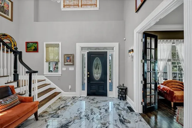 a living room with furniture and a window