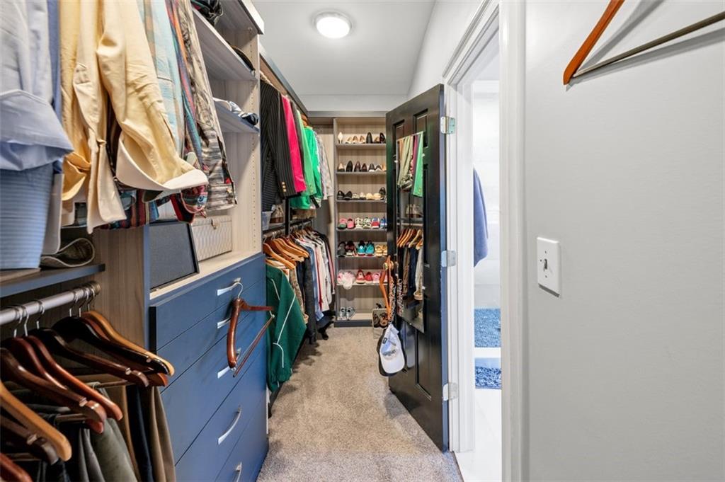 526 Hill Street Southeast Atlanta, GA 30312 - Photo 44 of 81 a view of walk in closet with clothes