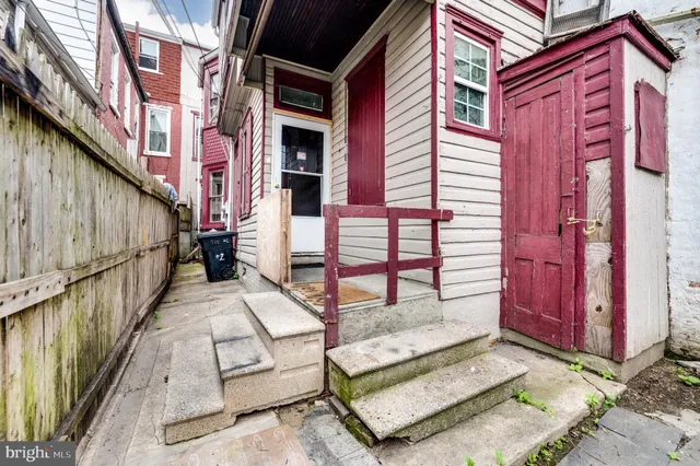 a view of balcony with furniture