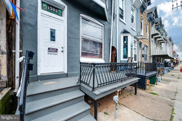 a car parked in front of a house