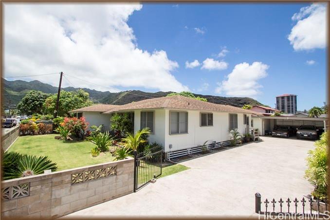 213 Elelupe Road Honolulu, HI 96821 - Photo 1 of 1 a front view of a house with garden